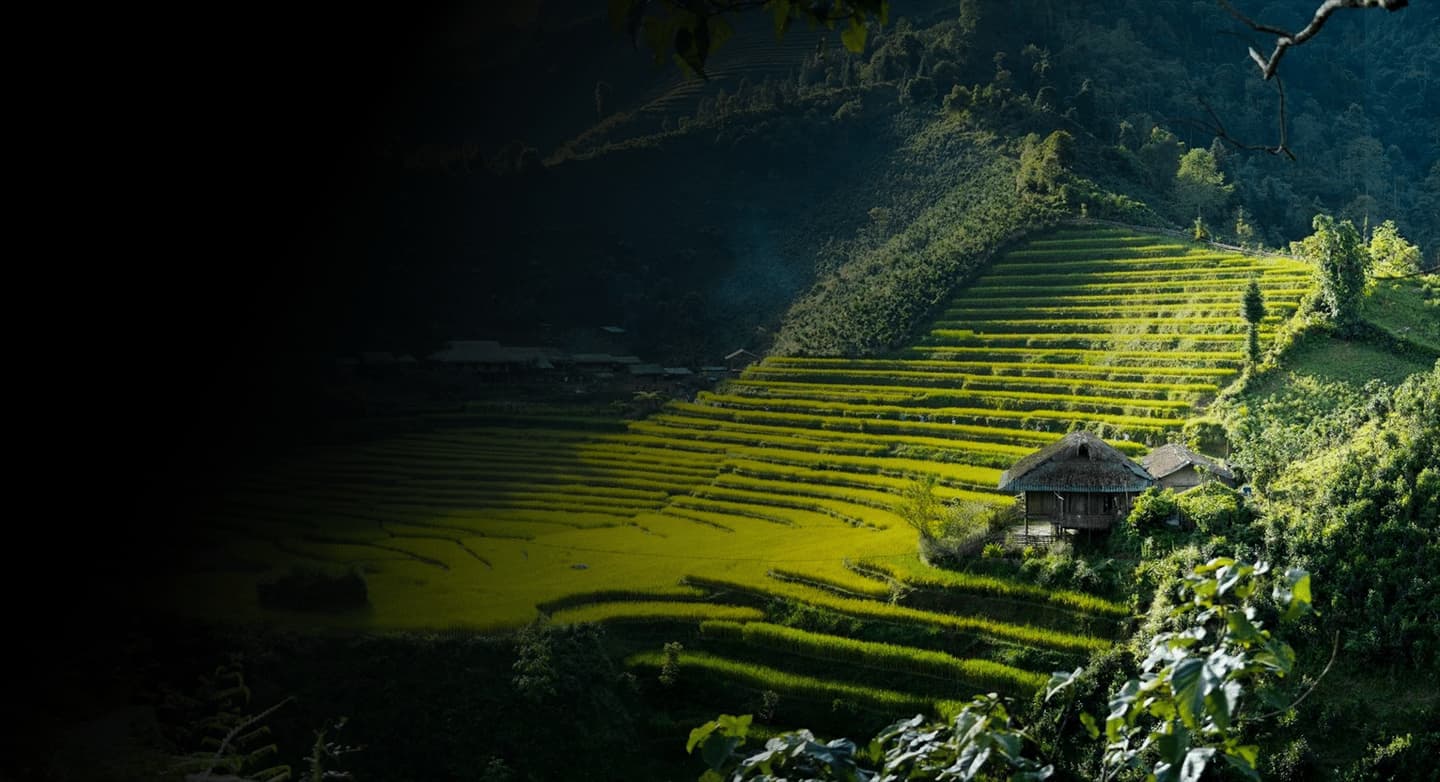 Riders on the Ha Giang Loop with mountains behind